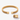 Gold-tone mesh C-shaped open bracelet with a heart and U engraved on one end cap, with an engraving close-up