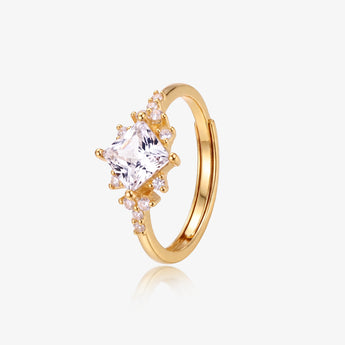 Gold-tone square cubic zirconia cluster open ring on white background