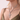 woman wearing a silver-tone rope chain necklace with a sparkling cross pendant