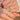 Couple holding hands wearing matching silver-tone solitaire rings with cubic zirconia